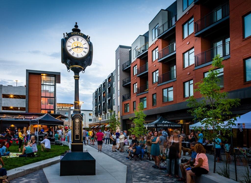 Loveland | rcastlemortgage.com A street view of downtown Loveland. Showcasing its modern architecture and calming atmosphere. Great place for homeowning. Get a quote from Robert Castle Mortgage today.