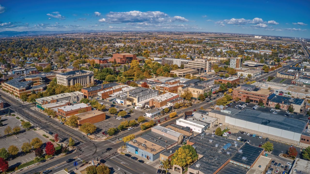Greeley | rcastlemortgage.com An aerial view of the city of Greeley. Showcasing its unique architecture and colorful atmosphere. Great place for homeowning. Robert Castle is helping buyers get the best mortgage rates in Greeley
