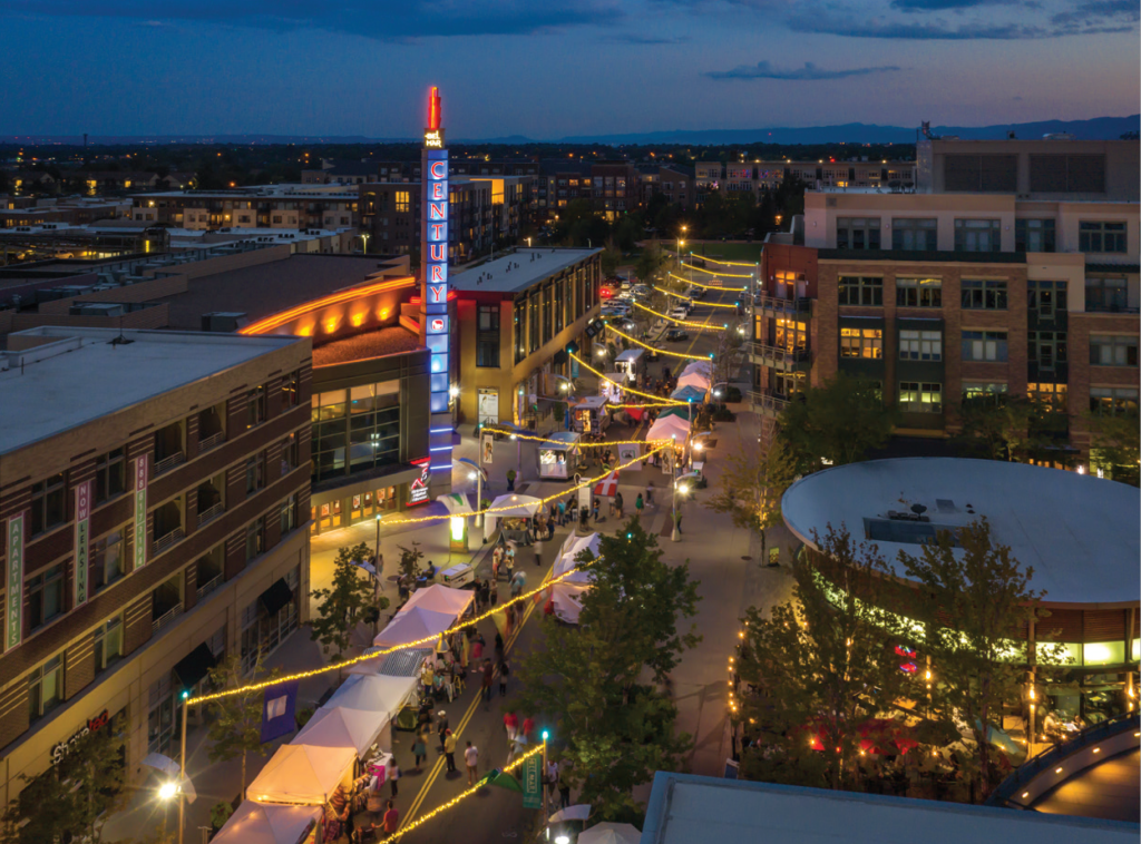 Lakewood | rcastlemortgage.com An aerial view of downtown Lakewood showcasing its skyline and a unique glow from infrastructure. Great place for homeowning. Get a quote from Robert Castle Mortgage today.