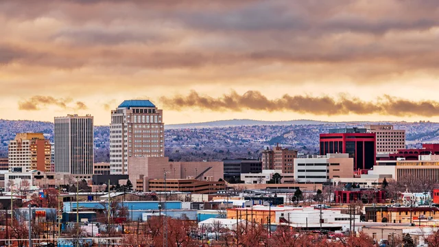 Colorado Springs | rcastlemortgage.com An aerial view of Colorado Springs and the beautiful view. With a vibrant sky and infrastructure. Great place for homeowning. Get a quote from Robert Castle Mortgage today.
