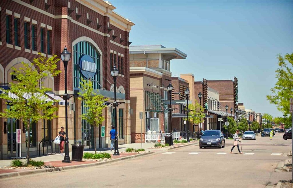Centennial | rcastlemortgage.com A street view of Centennial Colorado showcasing some businesses and beautiful architecture. Great place for homeowning. Get a quote from Robert Castle Mortgage today.